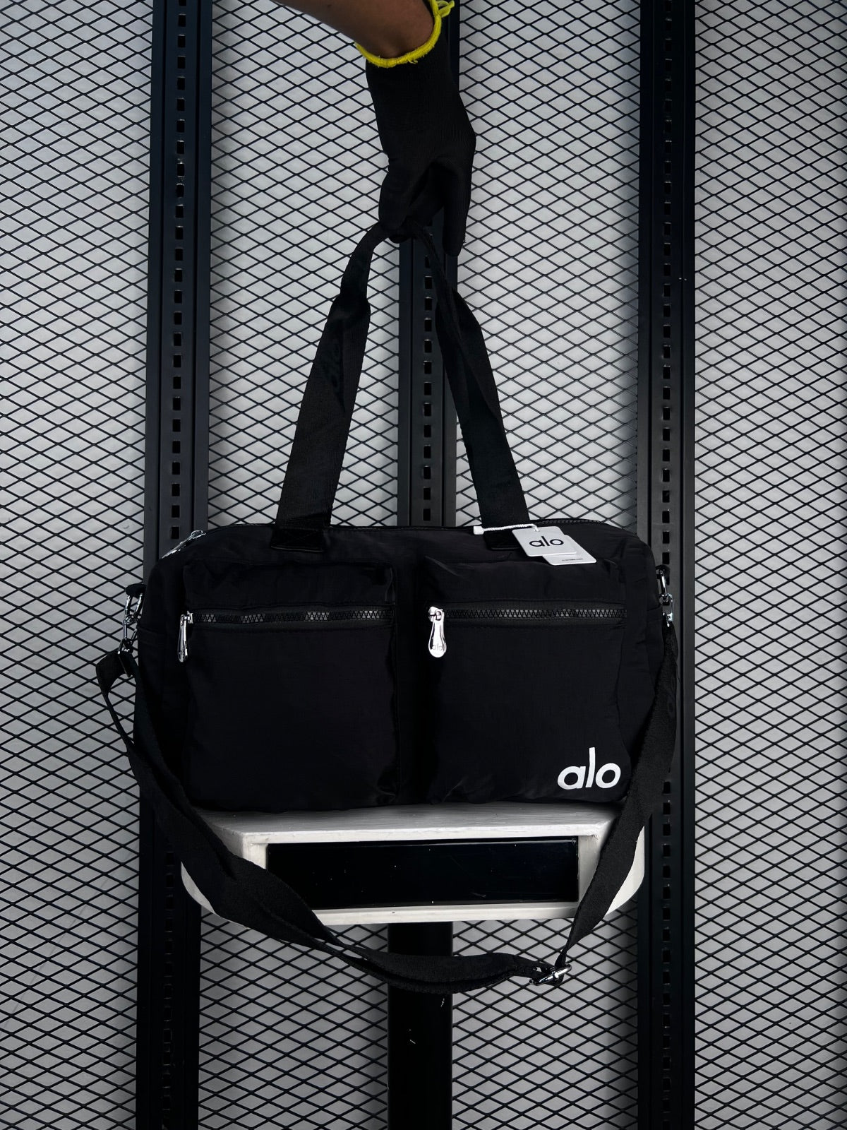 Matte nylon duffle bag with twin front zip pockets