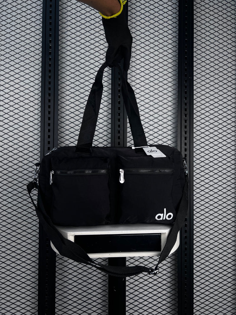 Matte nylon duffle bag with twin front zip pockets