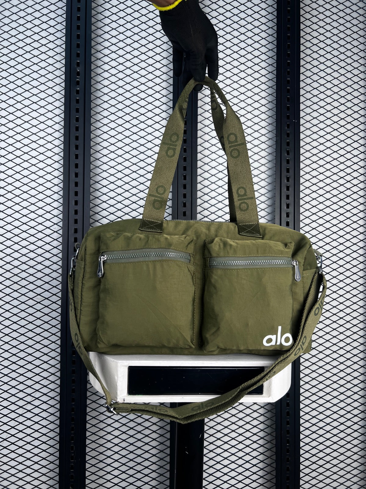 Nylon duffle bag in olive with zip pockets