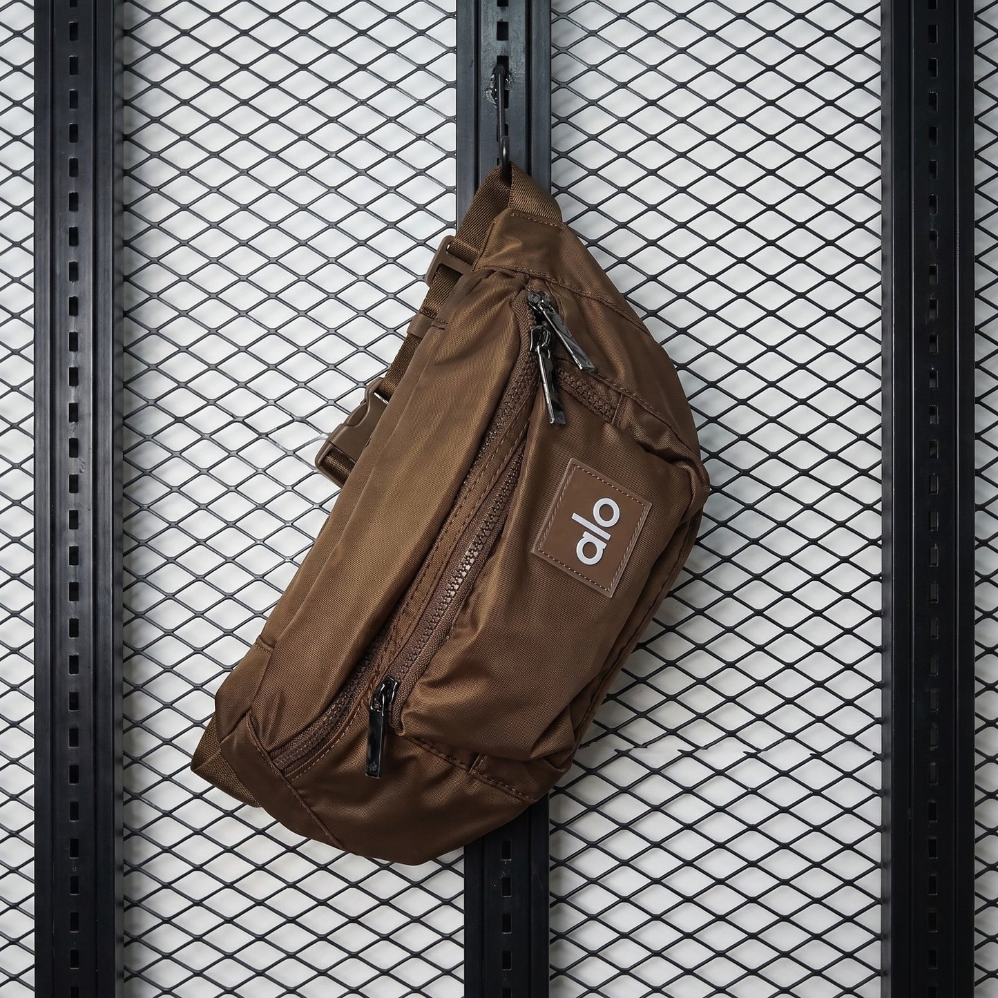 Brown nylon utility belt bag with front zip pocket