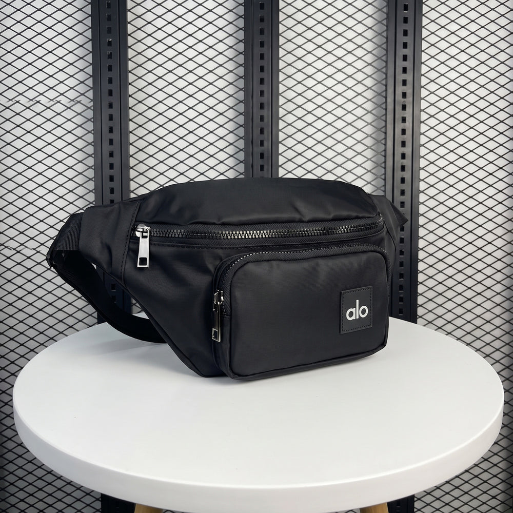 Black nylon belt bag with front zip pouch