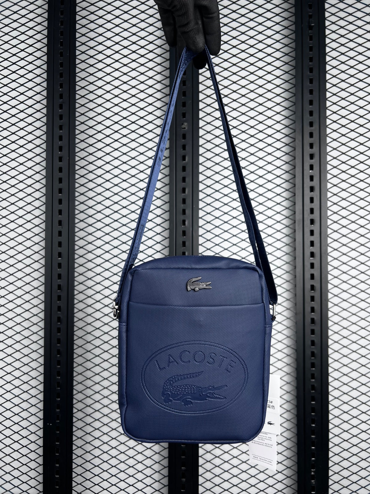 Embossed medallion navy blue reporter bag