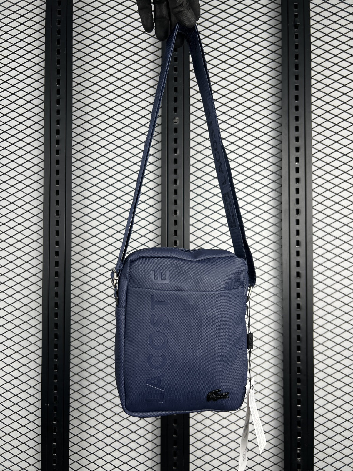 Vertical rectangular crossbody pouch in navy blue