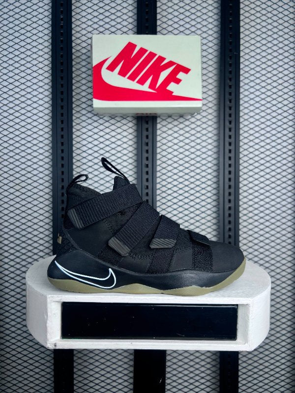 Triple-strap high-top basketball sneaker with gum sole