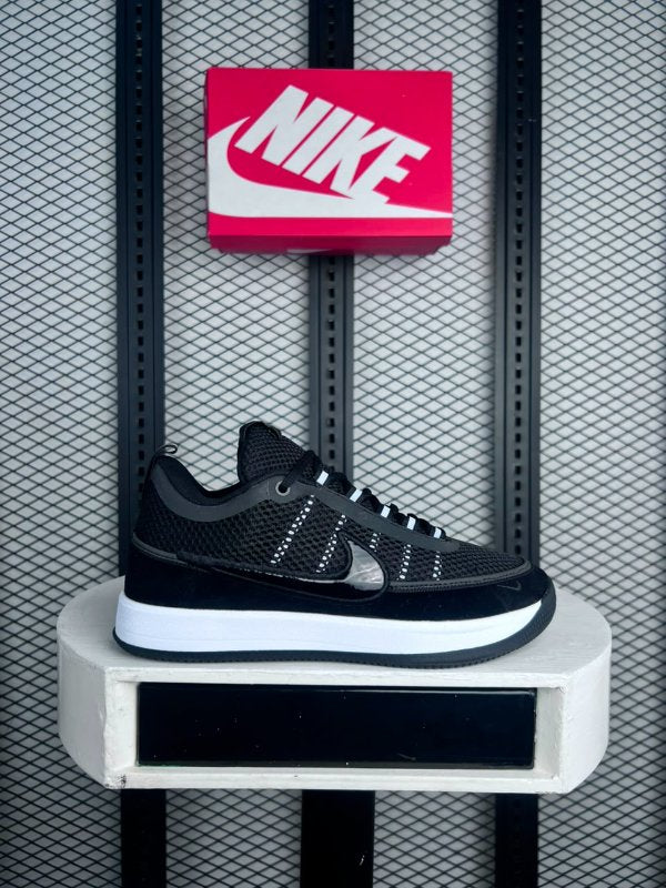Black textured mesh low-top with white cupsole