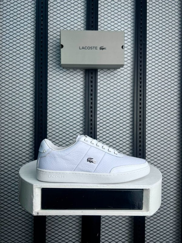 Textured leather low-top in white on a cup sole with a minimal finish