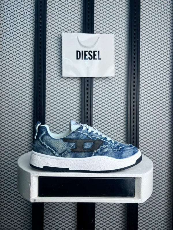 Raw-edge distressed denim sneaker with side appliqué