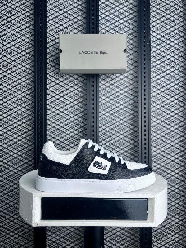 Textured leather low-top in black and white on a cup sole with a casual finish