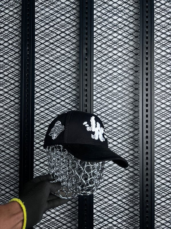 Twill curved-brim cap with raised puff embroidery