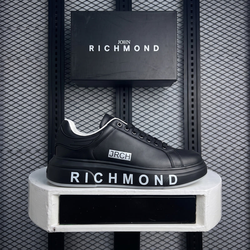 Black leather platform sneaker with white collar