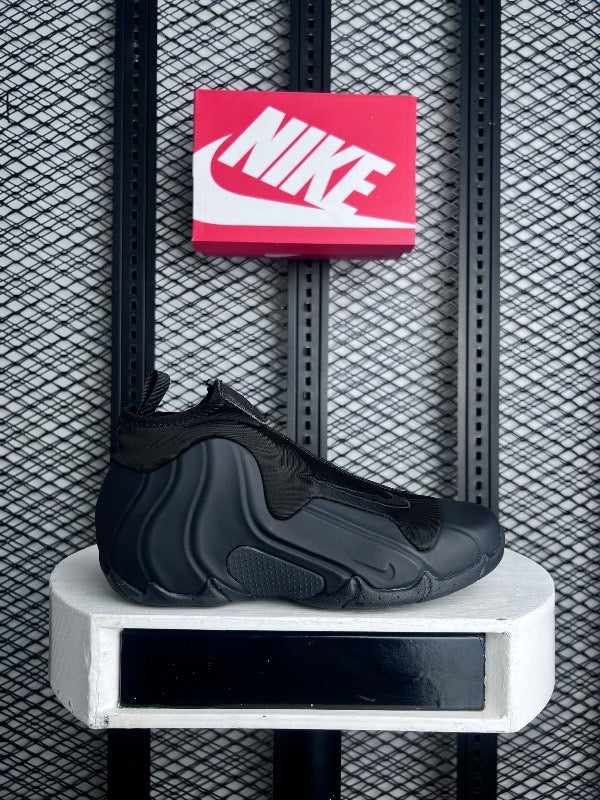 Matte black molded shell basketball trainer with zippered shroud