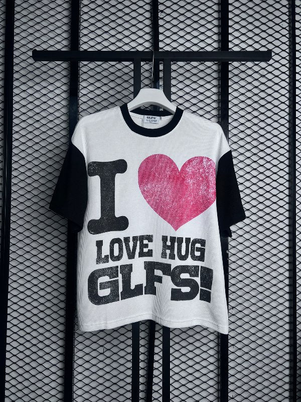 Textured-knit graphic ringer top in white and black