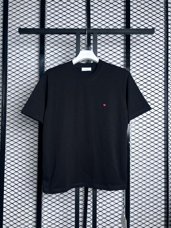 Black crewneck cotton tee with embroidered red heart