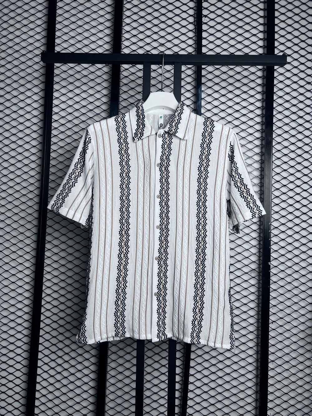 Boxy short-sleeve button-up with textured geometric stripes