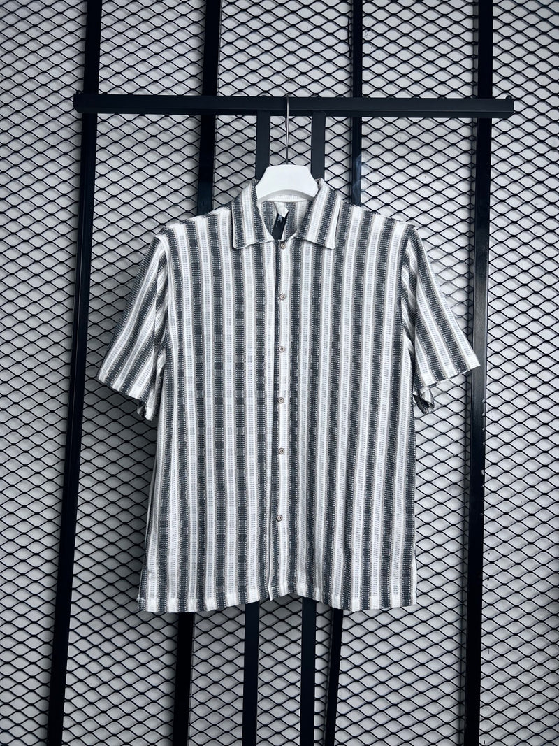 Short-sleeve camp collar silhouette in vertical textured stripe