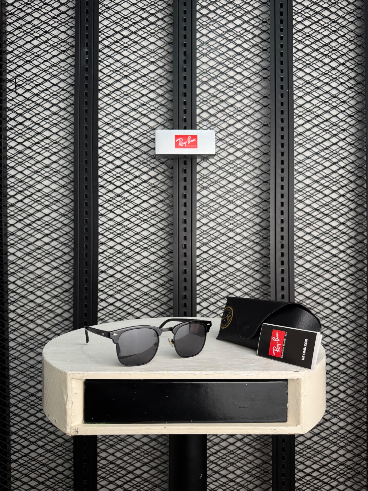 Gloss black browline sunglasses with dark tinted lenses