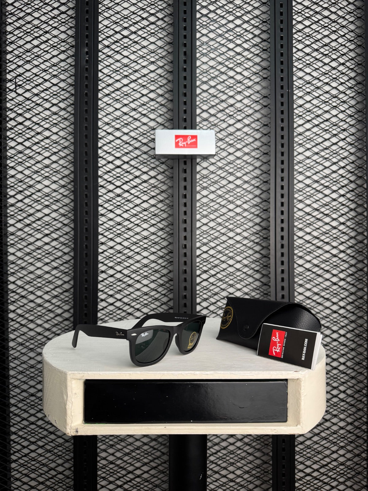 Matte black square sunglasses with dark green lenses