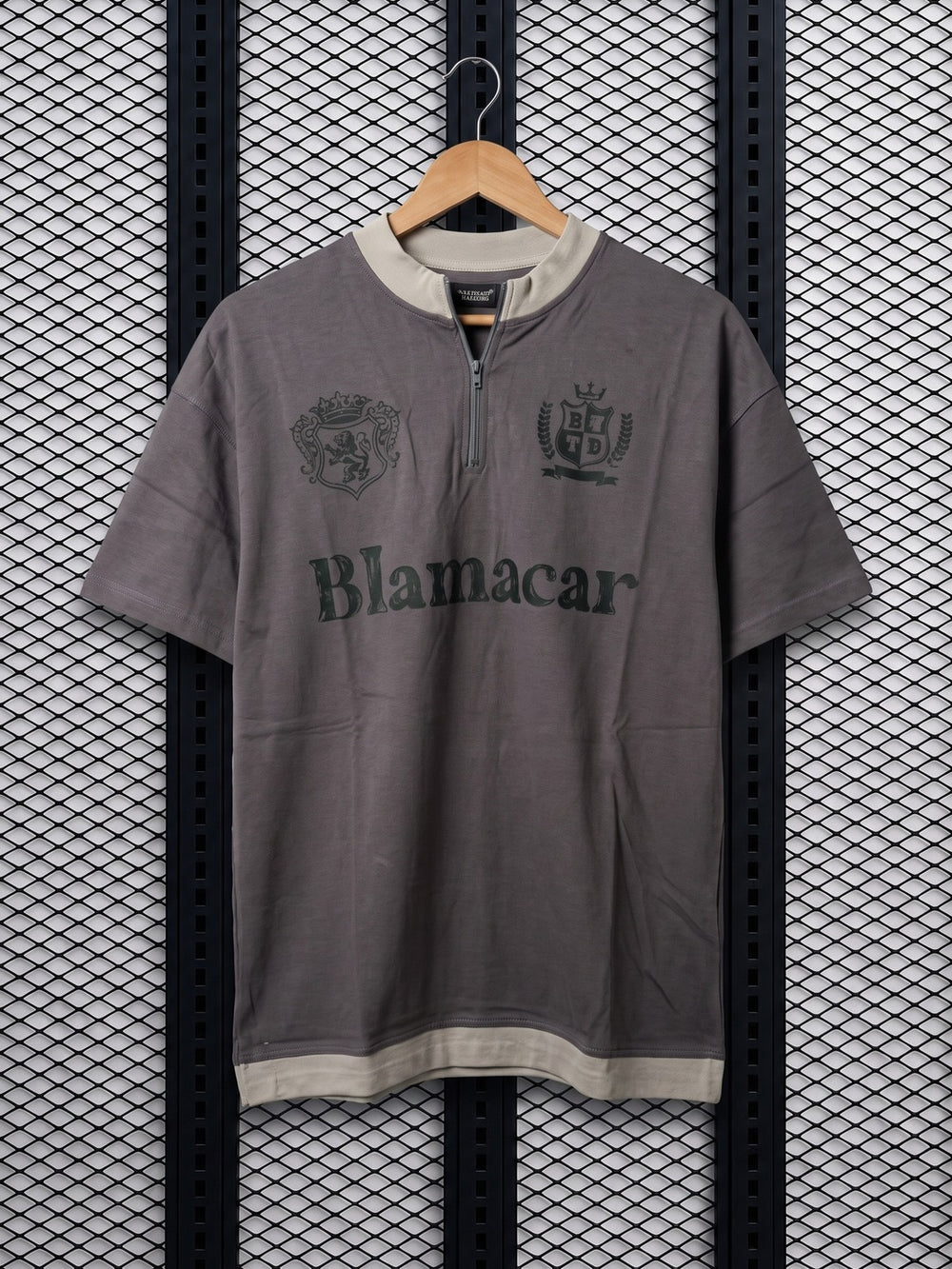 Graphic crest-print quarter-zip top with contrast trim