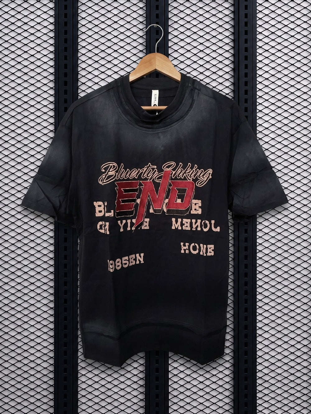 Faded black oversized graphic t-shirt with ribbed neck