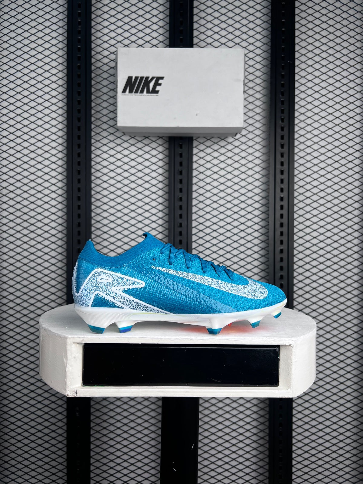 Dark green soccer boots